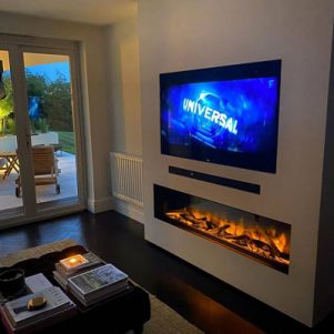 Evonic E1500 GF1 electric fire with false chimney breast incorporating TV and sound bar recesses creating a flush finish, Media Wall